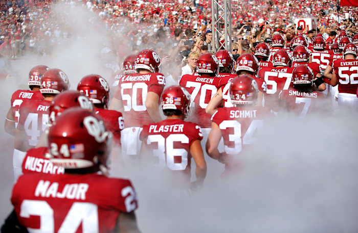 Oklahoma runs on to the field before the college football game between the University of Oklahoma Sooners and the University of Central Florida Knights at Gaylord Family Oklahoma-Memorial Stadium in Norman, Okla., Saturday, Oct., 21, 2023.